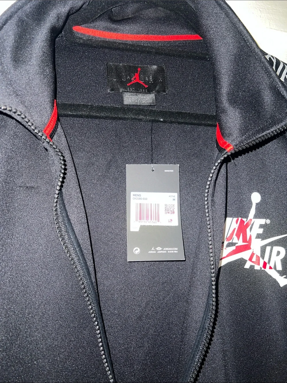 Jordan Black Track Jacket with White Logo and Sleeve Script